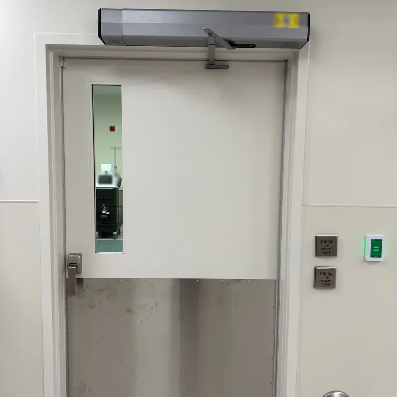 Door with an automatic door operator, two push plates and a card reader at Ortho AZ in Glendale, AZ