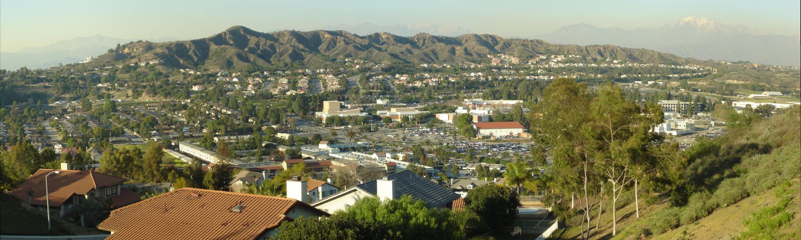 Panoramic view of Walnut, California and the Mt. San Antonio College campus with hills behind